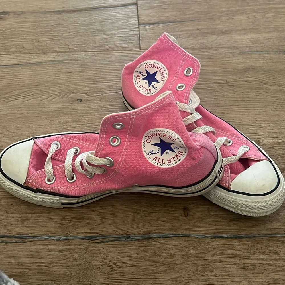 Pink High top converse 
Size 7 women’s (size 5 men’s)